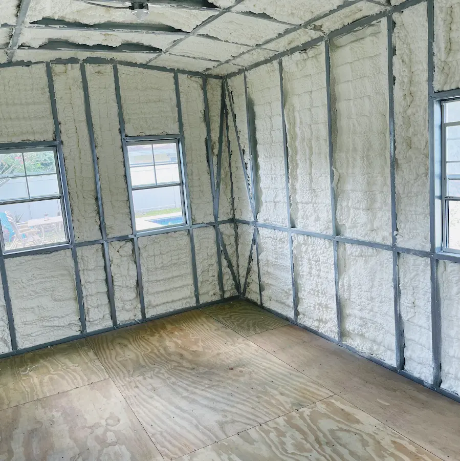 Closed-cell spray foam insulation applied to wall cavities in a residential project in Kaysville